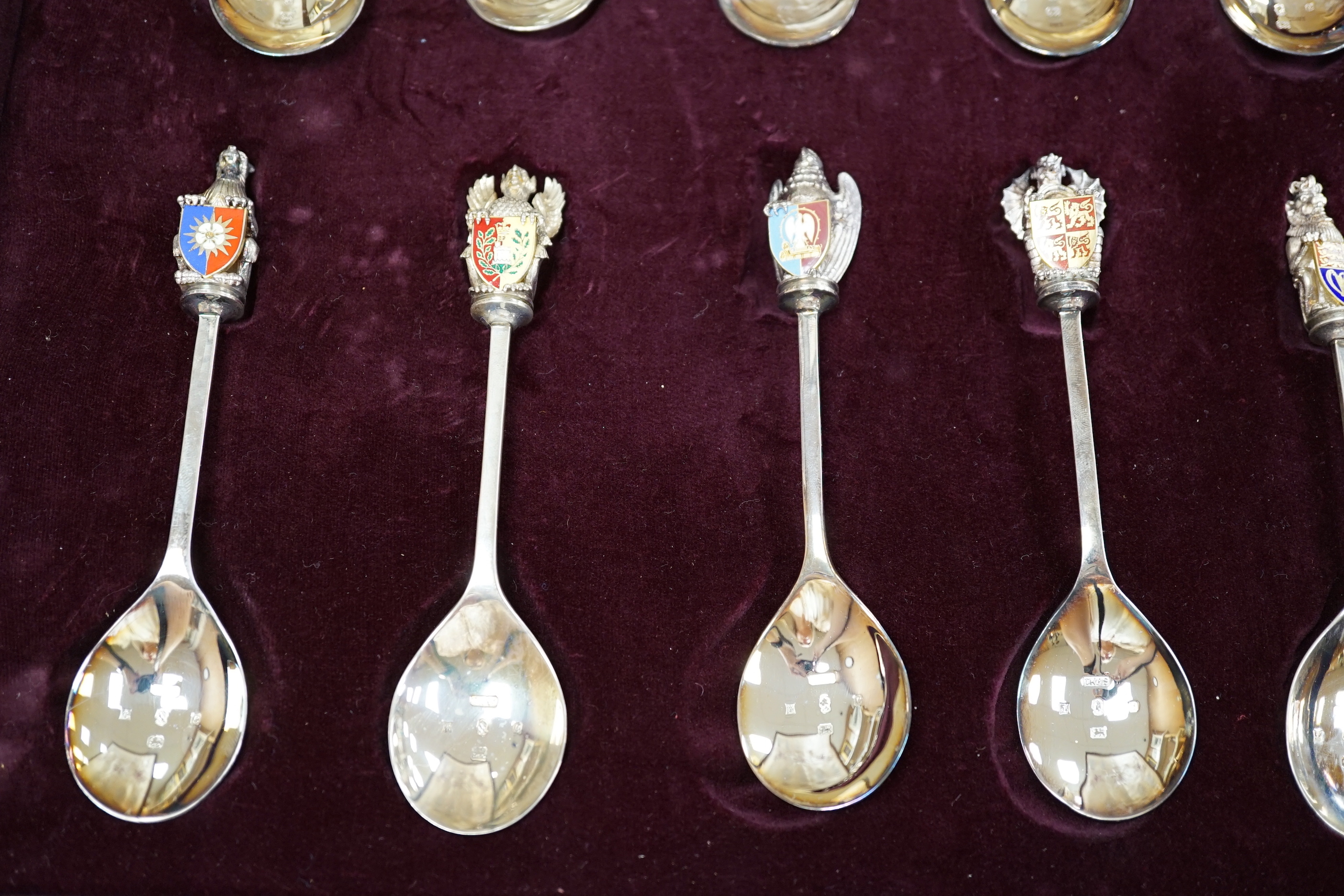 A modern limited edition cased set of ten silver and enamel 'The Queens Beasts Spoons', by Toye, Kenning & Spencer, no. 345/2500.